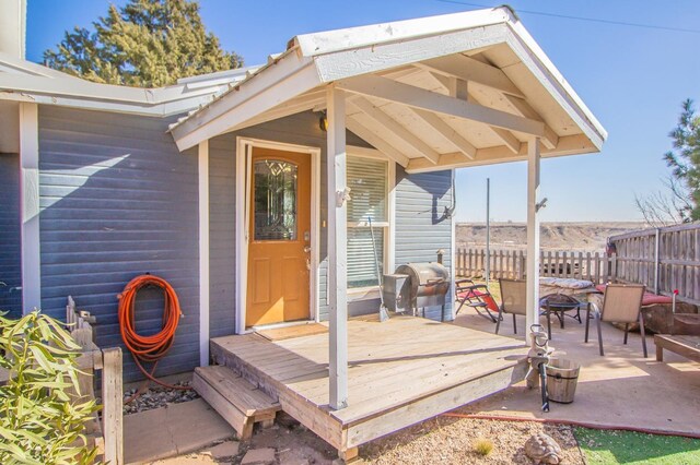 doorway to property with a deck