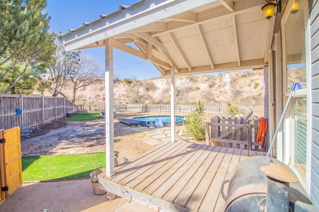 view of patio / terrace featuring a pool side deck