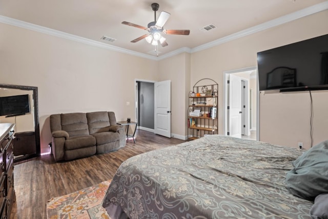 bedroom with hardwood / wood-style floors, ornamental molding, and ceiling fan