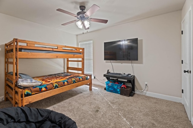 bedroom featuring ceiling fan and carpet flooring