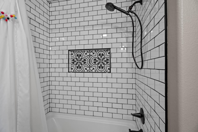 details with shower / bath combination with curtain