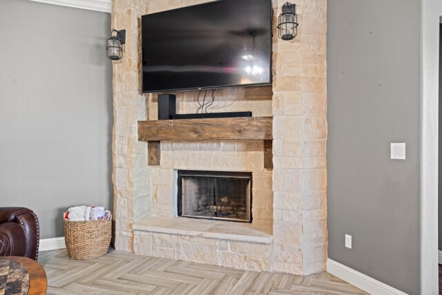 living room featuring parquet floors and a fireplace