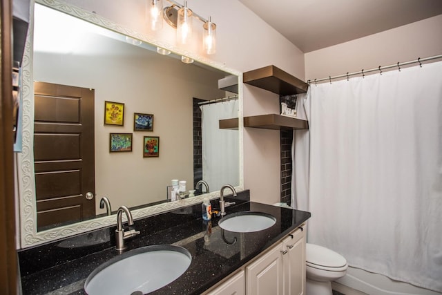 full bathroom with vanity, toilet, and shower / bath combo with shower curtain