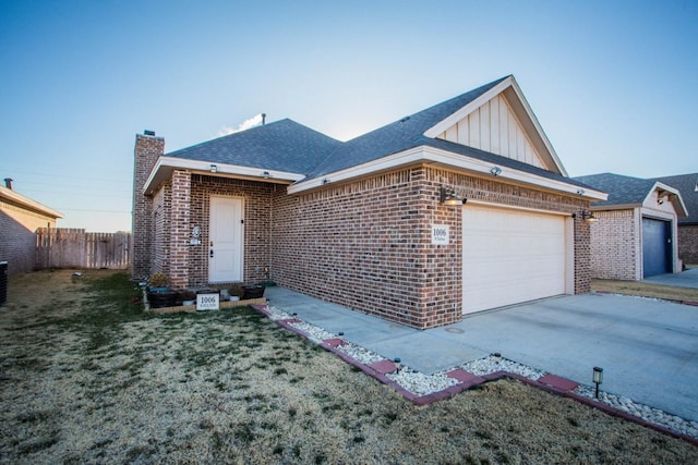 ranch-style home with a garage and a front yard