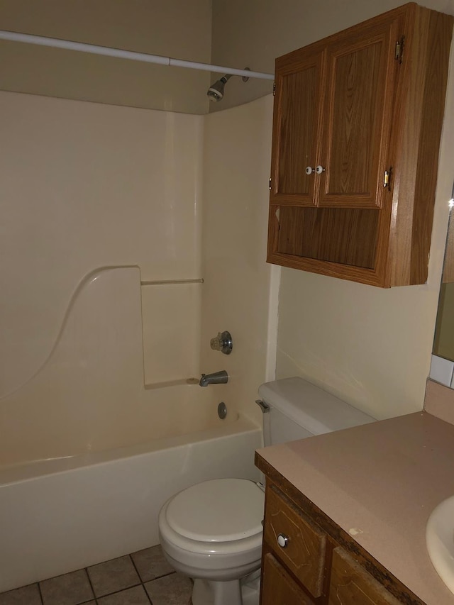 full bathroom featuring vanity, tile patterned flooring, tub / shower combination, and toilet