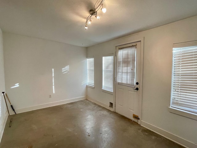 foyer with concrete flooring