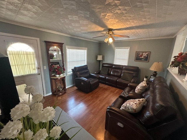 living room featuring ceiling fan, ornamental molding, and hardwood / wood-style floors