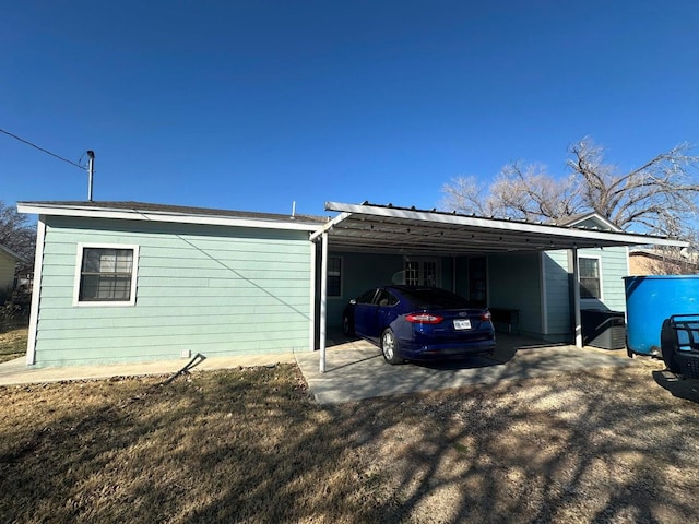 view of home's exterior featuring a carport