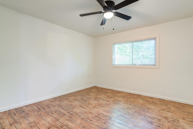 unfurnished room featuring ceiling fan and light wood-type flooring