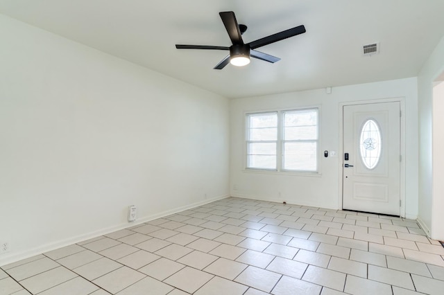 foyer entrance featuring ceiling fan