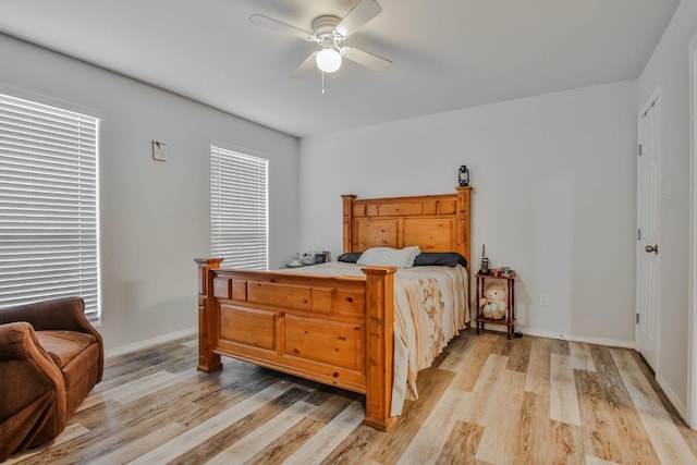 bedroom featuring ceiling fan and light wood-type flooring