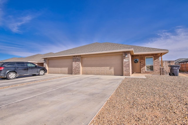 view of front of property with a garage