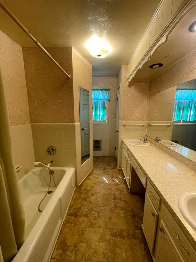 bathroom featuring vanity and a textured ceiling