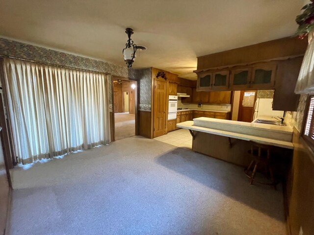 carpeted bedroom featuring sink