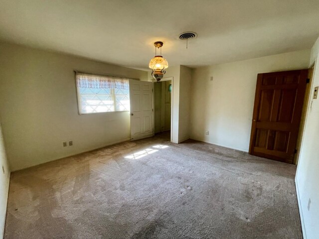 unfurnished bedroom featuring carpet floors