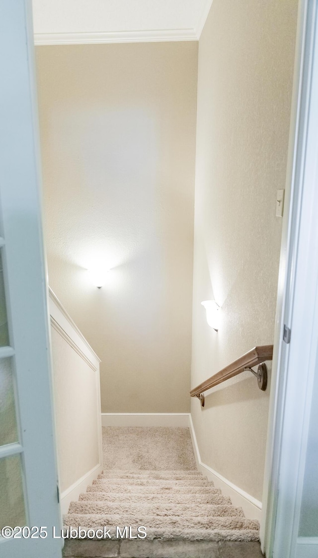 9805 Savannah Ave, Lubbock, TX 79424 - stairs featuring carpet, ornamental molding, and baseboards