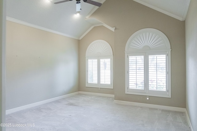 9805 Savannah Ave, Lubbock, TX 79424 - unfurnished room with vaulted ceiling, light carpet, a ceiling fan, and baseboards
