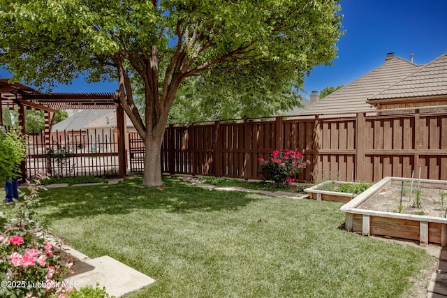 9805 Savannah Ave, Lubbock, TX 79424 - view of yard with a vegetable garden