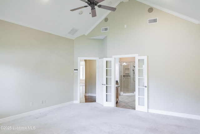 9805 Savannah Ave, Lubbock, TX 79424 - unfurnished bedroom with french doors, carpet floors, high vaulted ceiling, baseboards, and ensuite bath