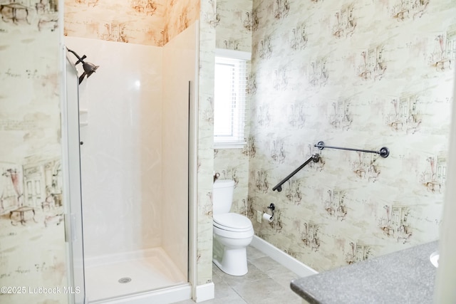9805 Savannah Ave, Lubbock, TX 79424 - bathroom featuring toilet and a stall shower