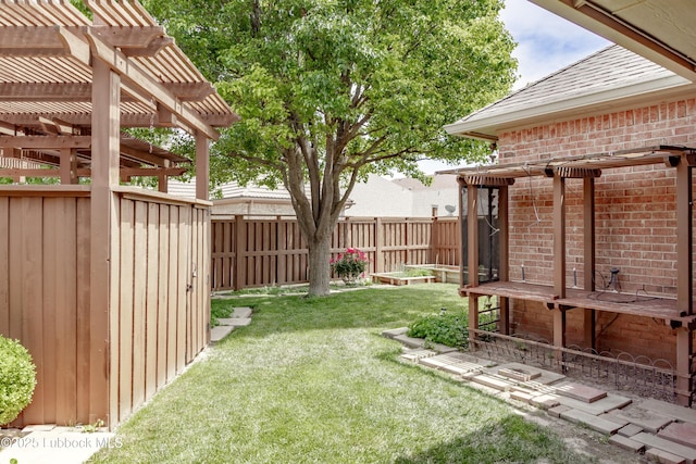9805 Savannah Ave, Lubbock, TX 79424 - view of yard featuring a pergola