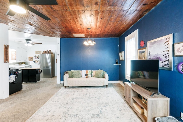 carpeted living room with ceiling fan with notable chandelier and wood ceiling