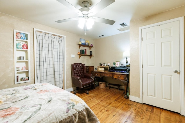 bedroom featuring ceiling fan and light hardwood / wood-style flooring