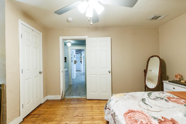 bedroom featuring ceiling fan and light wood-type flooring