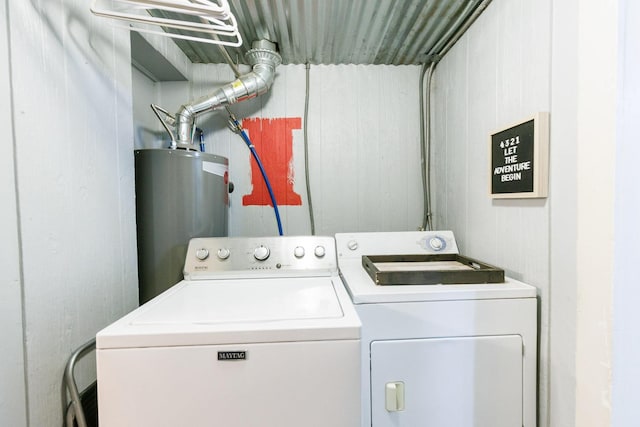 laundry area with washer and dryer and gas water heater