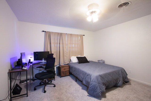 5426 9th St, Lubbock, TX 79416 - carpeted bedroom featuring a desk and baseboards