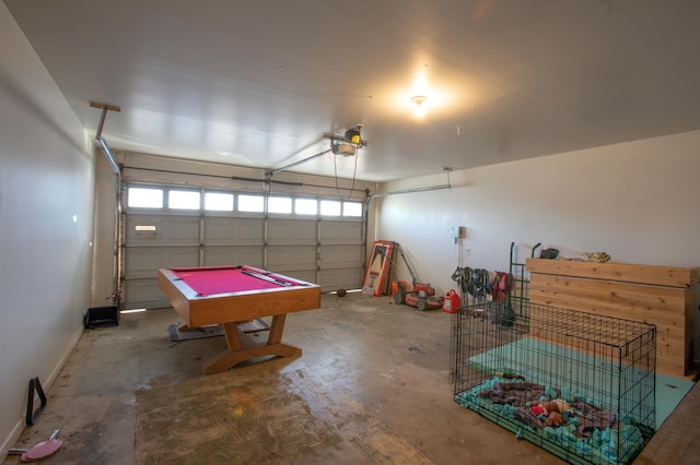 5426 9th St, Lubbock, TX 79416 - garage with a garage door opener and baseboards