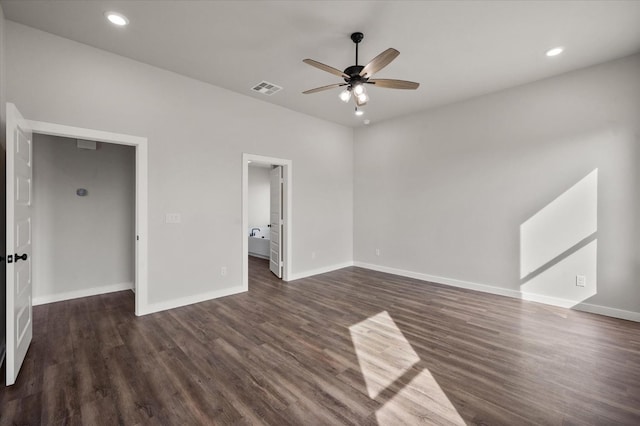 unfurnished bedroom featuring ceiling fan and dark hardwood / wood-style flooring