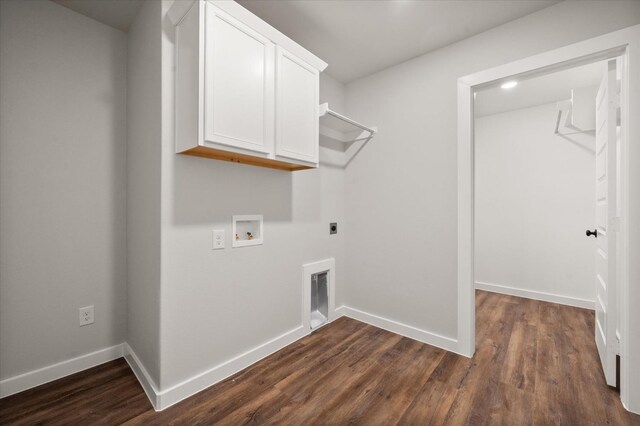 washroom featuring washer hookup, cabinets, dark wood-type flooring, and hookup for an electric dryer