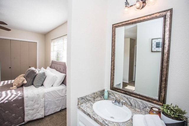 bathroom featuring vanity and ceiling fan