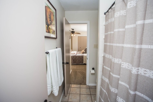 bathroom featuring tile patterned flooring and ceiling fan