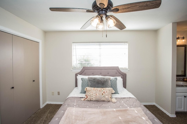 carpeted bedroom featuring sink, a closet, and ceiling fan