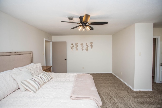 bedroom featuring ceiling fan and carpet