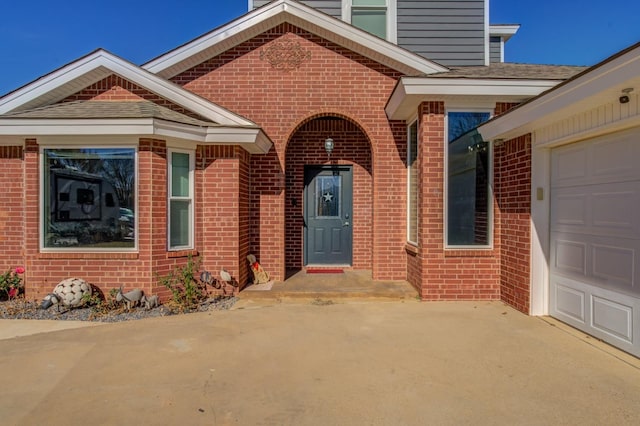 entrance to property featuring a garage