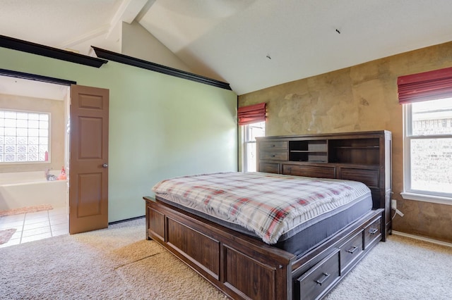 carpeted bedroom with vaulted ceiling with beams