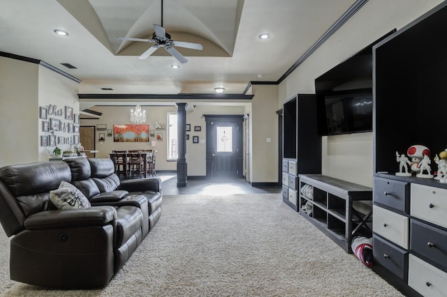 living room featuring crown molding, ceiling fan, and decorative columns