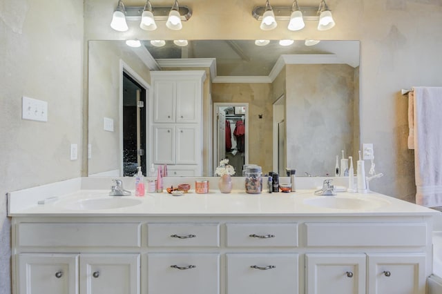 bathroom featuring vanity and crown molding