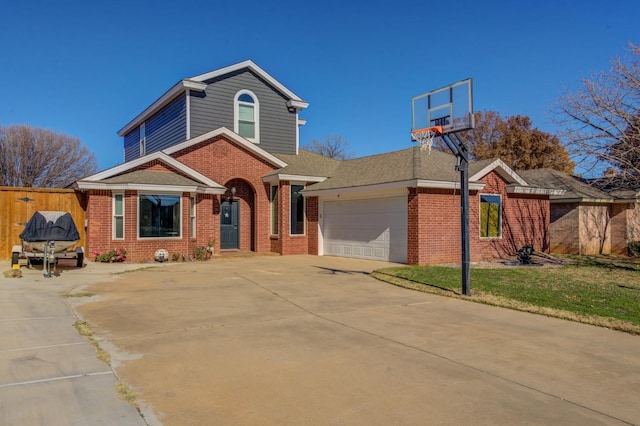 front facade featuring a garage and a front lawn