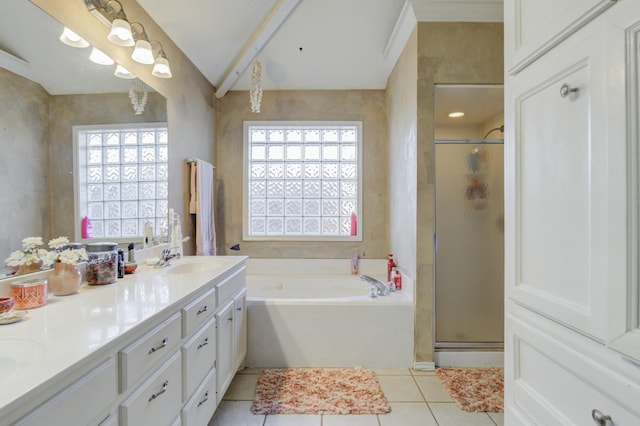 bathroom with tile patterned flooring, plus walk in shower, and a wealth of natural light