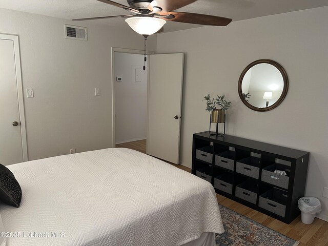 8601 Memphis Dr Unit B-40, Lubbock, TX 79423 - bedroom featuring wood finished floors and a ceiling fan