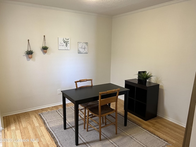 8601 Memphis Dr Unit B-40, Lubbock, TX 79423 - dining space with wood finished floors, ornamental molding, and baseboards