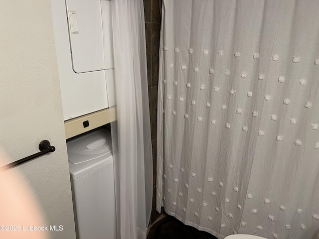 8601 Memphis Dr Unit B-40, Lubbock, TX 79423 - washroom featuring stacked washer / dryer