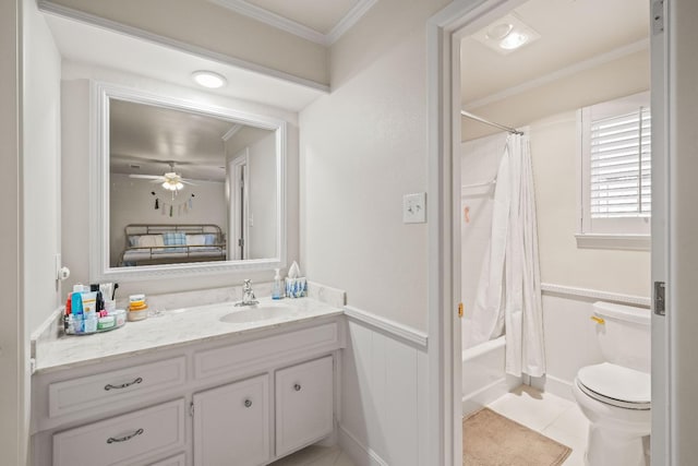 full bathroom with crown molding, vanity, tile patterned floors, toilet, and shower / bath combo with shower curtain