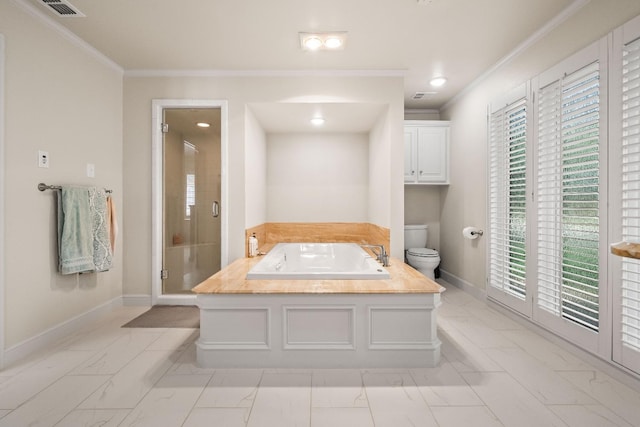 bathroom featuring ornamental molding, independent shower and bath, and toilet