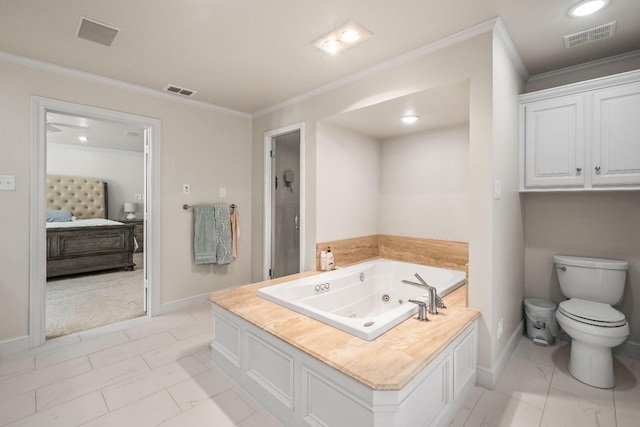 bathroom with ornamental molding, toilet, and a washtub