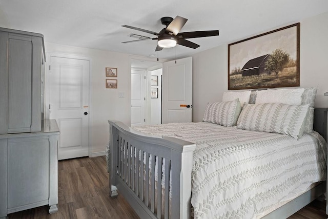 bedroom featuring ceiling fan and dark hardwood / wood-style flooring